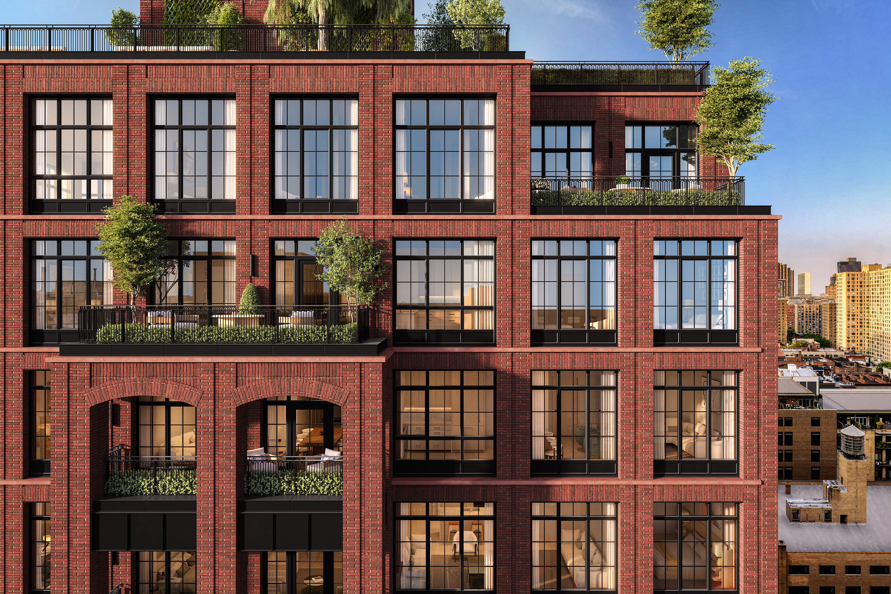 Brick crown of The Willow Residences featuring landscaped terraces and industrial-style windows in Gramercy, NYC