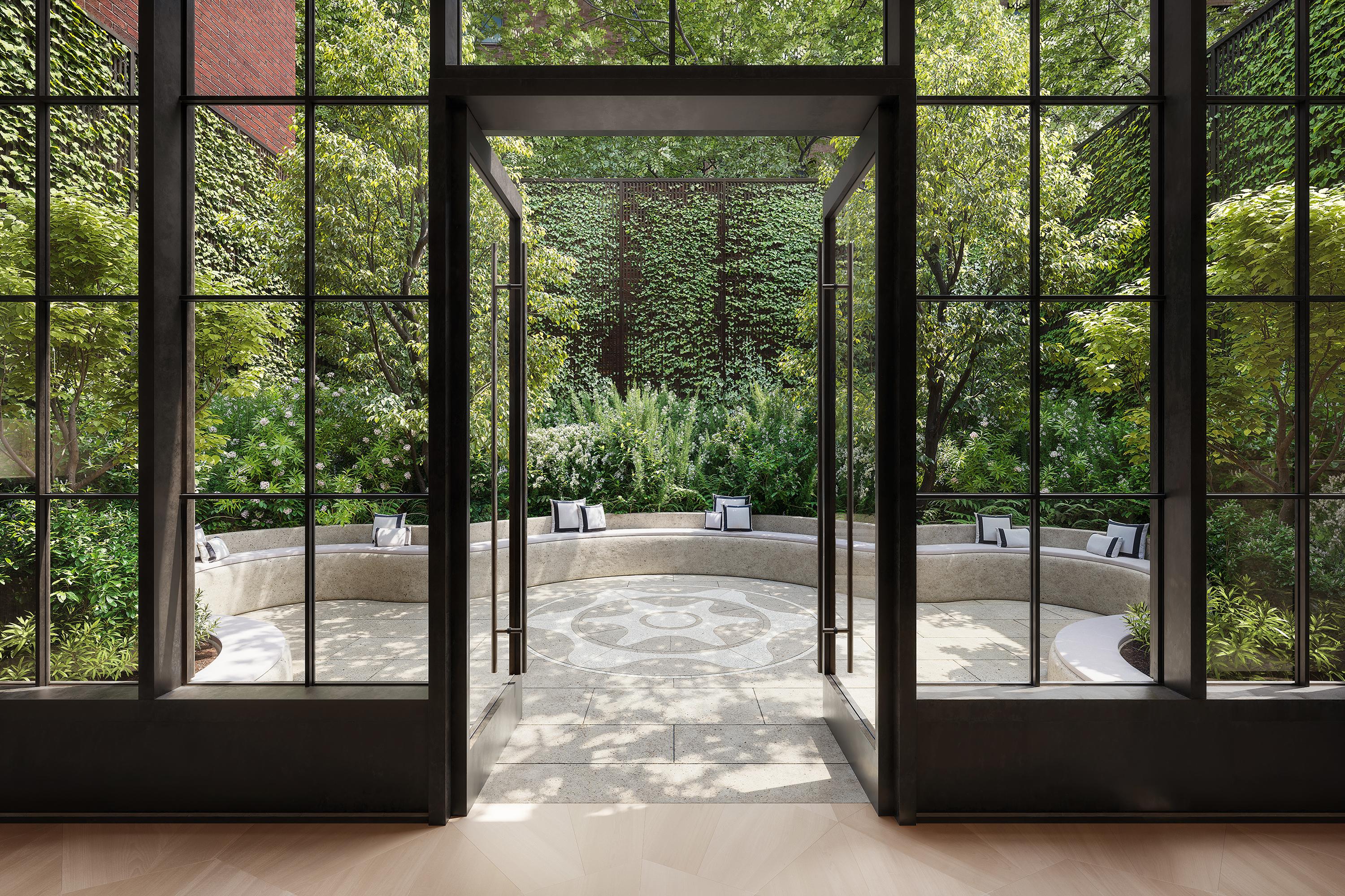 Courtyard surrounded by lush greenery at The Willow Residences in Gramercy, NYC.